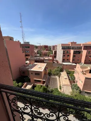 a view of a city from a balcony at Stunning 2BR in Top Location Marrakech City Center in Marrakech
