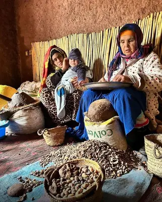 a group of women and children sitting on a couch at Atlas Mountains 3 Valleys Experience All-Inclusive Private Tour from Marrakesh in Marrakech
