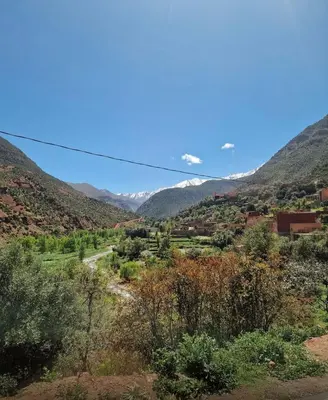 a view of a valley with mountains in the background at Atlas Mountains 3 Valleys Experience All-Inclusive Private Tour from Marrakesh in Marrakech