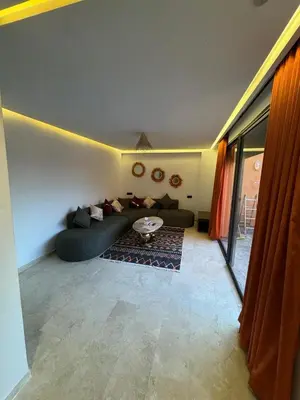 a living room with a couch and a table at for you - perfect place in Marrakech