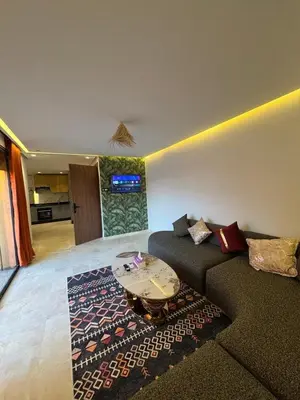 a living room with a couch and a table at for you - perfect place in Marrakech