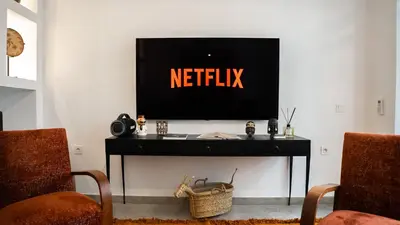 a tv on a wall with the netflix sign on it at Manzil Fanny Private Riad & Spa in Marrakech
