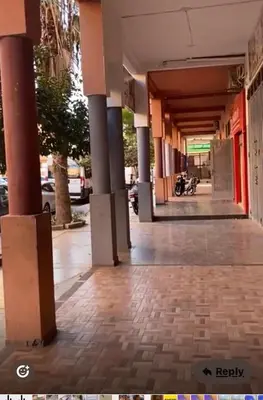 an empty hallway of a building with a motorcycle parked at Marrakech 2 bedroom flat in Marrakech