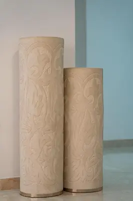 a pair of vases sitting next to each other at Appartement Deluxe 2 chambres GUELIZ, Piscines, Spa, Gym in Marrakech