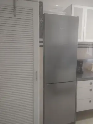 a stainless steel refrigerator in a kitchen at Appartement cosy Marrakech in Marrakech