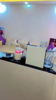 a counter with a white sign on top of it at Apartment near Mènera gardens and city center in Marrakech