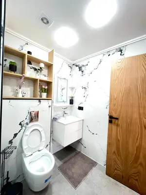 a bathroom with a toilet and a sink at MayyRakech in Marrakech