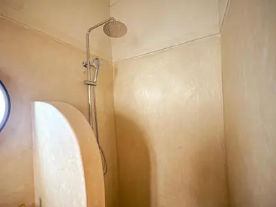 a shower in the corner of a bathroom at Riad Medina Luxury Charm in Marrakech