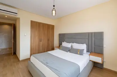 a bedroom with a large bed in a room at Marrakech in Marrakech