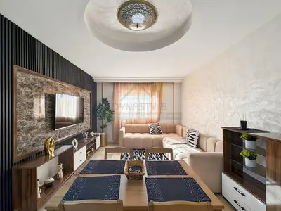 a living room with a couch and a table at Confort Moderne au Cœur de Marrakech Proche Gare in Marrakech