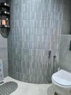a bathroom with a shower and a toilet at Apartment near Gueliz and Majorelle in Marrakech