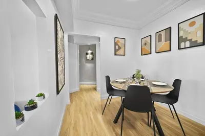 a dining room with a table and chairs at Centre Town Cozy Apartment with Panoramic View in Marrakech