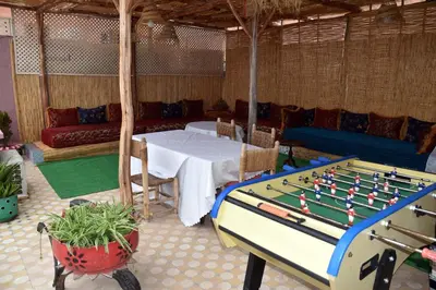 a ping pong table in a room with a pool table at Lyron Hostel & Privates rooms Gueliz in Marrakech