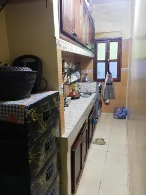 a kitchen with a sink and a counter top at famile 154 in Marrakech