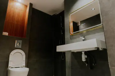 a bathroom with a sink and a toilet at Appartement moderne in Marrakech