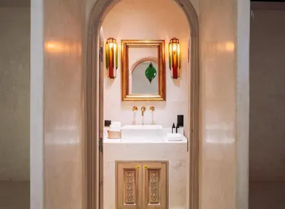 a bathroom with a sink and a mirror at Riad Ever - Entièrement privatisé in Marrakech