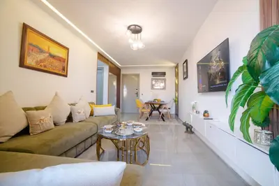 a living room with a couch and a table at Appartemment top Marrakech in Marrakech