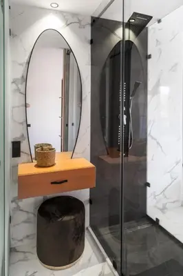 a bathroom with a shower and a mirror at 3 BED Hidden Gem Self Check-in With Pool M6 BLVD in Marrakech