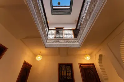 an ornate coffered ceiling in a hallway at Riad Abrare-A in Marrakech