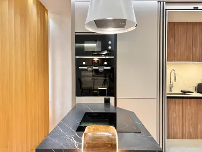 a kitchen with a black counter with a stove at Verona Studio - 1 Bedroom Piscine & Rooftop in Marrakech