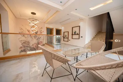 a dining room with chairs and a table at Villa Soliya 4 Rooms with private pool in Marrakech