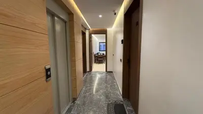 a hallway with a hallway leading to a room at Stylish 1-Bed Retreat in Marrakech