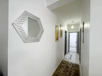 a mirror on a wall in a hallway at L'Havre de Paix 2 in Marrakech