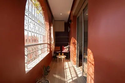 a hallway with a stained glass window in a building at Maison M, Spacious 2-Bedroom Apartment in Marrakech in Marrakech