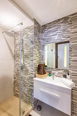 a bathroom with a sink and a shower at Résidence jnan ali 4 Marrakech in Marrakech
