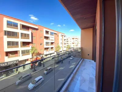 a view of a city street from a building at Hermès home in Marrakech