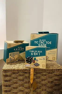 a pile of boxes on top of a wicker basket at Riad chic Suite élégante au coeur de Marrakech in Marrakech
