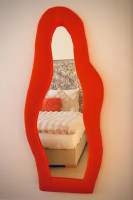 a mirror shaped like a bed in a room at Luxury Villa Hedi in Marrakech
