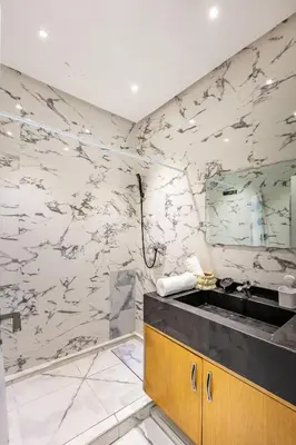 a bathroom with a sink and a mirror at Harmony Elegance and Comfort near Gueliz in Marrakech