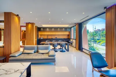 a living room with a couch and a table at Luxury Apartment in Central Hivernage in Marrakech