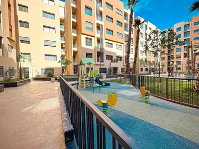 a playground in the middle of a building at Luxury Studio Guéliz Pools, Jacuzzi Fitness in Marrakech
