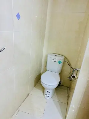 a bathroom with a white toilet in a stall at Soman Marrakech in Marrakech