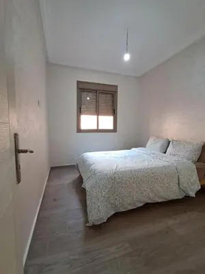 a bedroom with a bed and a window at comfortable stay in Marrakesh in Marrakech