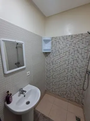 a bathroom with a sink and a mirror at comfortable stay in Marrakesh in Marrakech