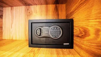 a small television sitting on a wooden floor at New Apartment in Gueliz with Private Terrace in Marrakech