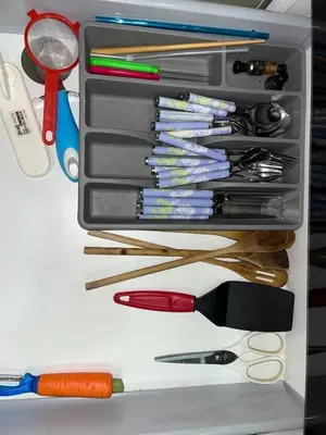 a drawer filled with lots of different types of utensils at Garden Apartment 5 min from Gueliz in Marrakech