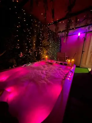a stage with pink lights in a room at Majorelle Terracotta Spa in Marrakech