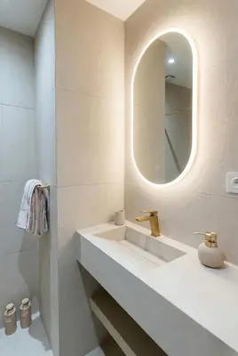 a bathroom with a sink and a mirror at Modern & Luxurious Apartment, Terrace with panoramic view of Gueliz in Marrakech