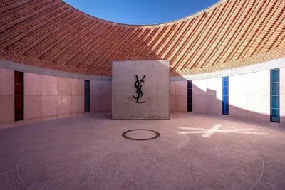 a large room with a statue in the middle of a building at Pause in the City - Duplex - Marrakech Centre in Marrakech