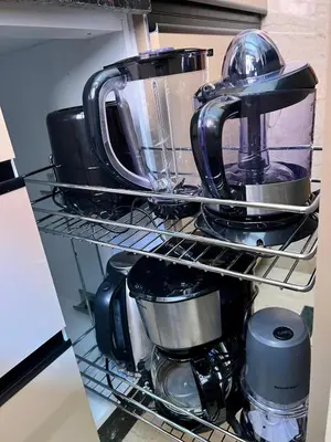 a kitchen appliance on a shelf in a kitchen at Bel appartement à Babylone 1 in Marrakech