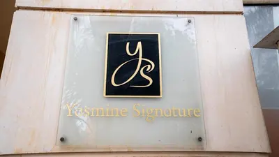 a sign on the side of a building at Yasmine Majorelle Residence Apartment in Marrakech