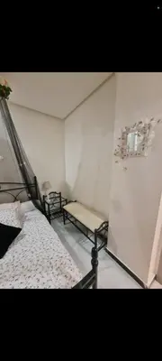 a room with two beds in a room at Nilia in Marrakech