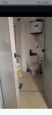 a bathroom with a toilet and a sink at Chambre individuelle studio in Marrakech