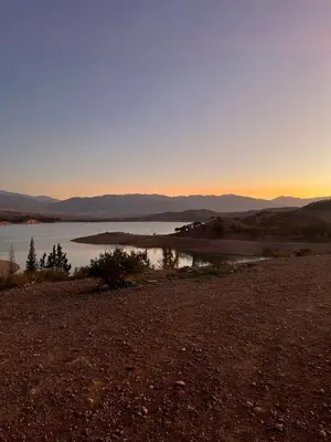 a view of a body of water at sunset at Riad traditionnel Kham's centre Marrakech in Marrakech