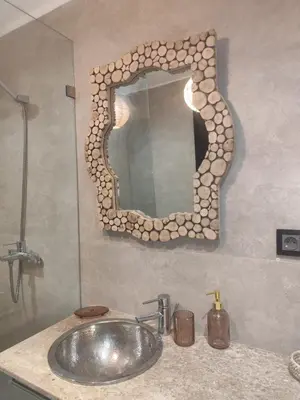 a bathroom with a sink and a mirror on the wall at Résidence Atlas Golf Marrakech in Marrakech