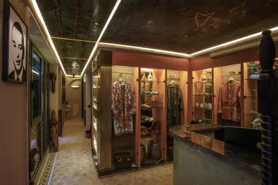 a store with racks of clothing in a room at Riad Kalemat & Spa in Marrakech